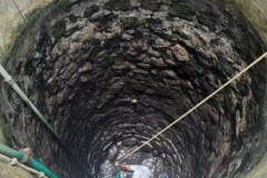 Cleaning of College well in progress.
